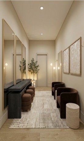 The groom's getting ready room, quiet and appointed in warm wood tones